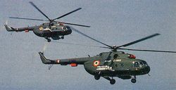 A pair of Mi-17s armed with UB-57 57mm rocket pods