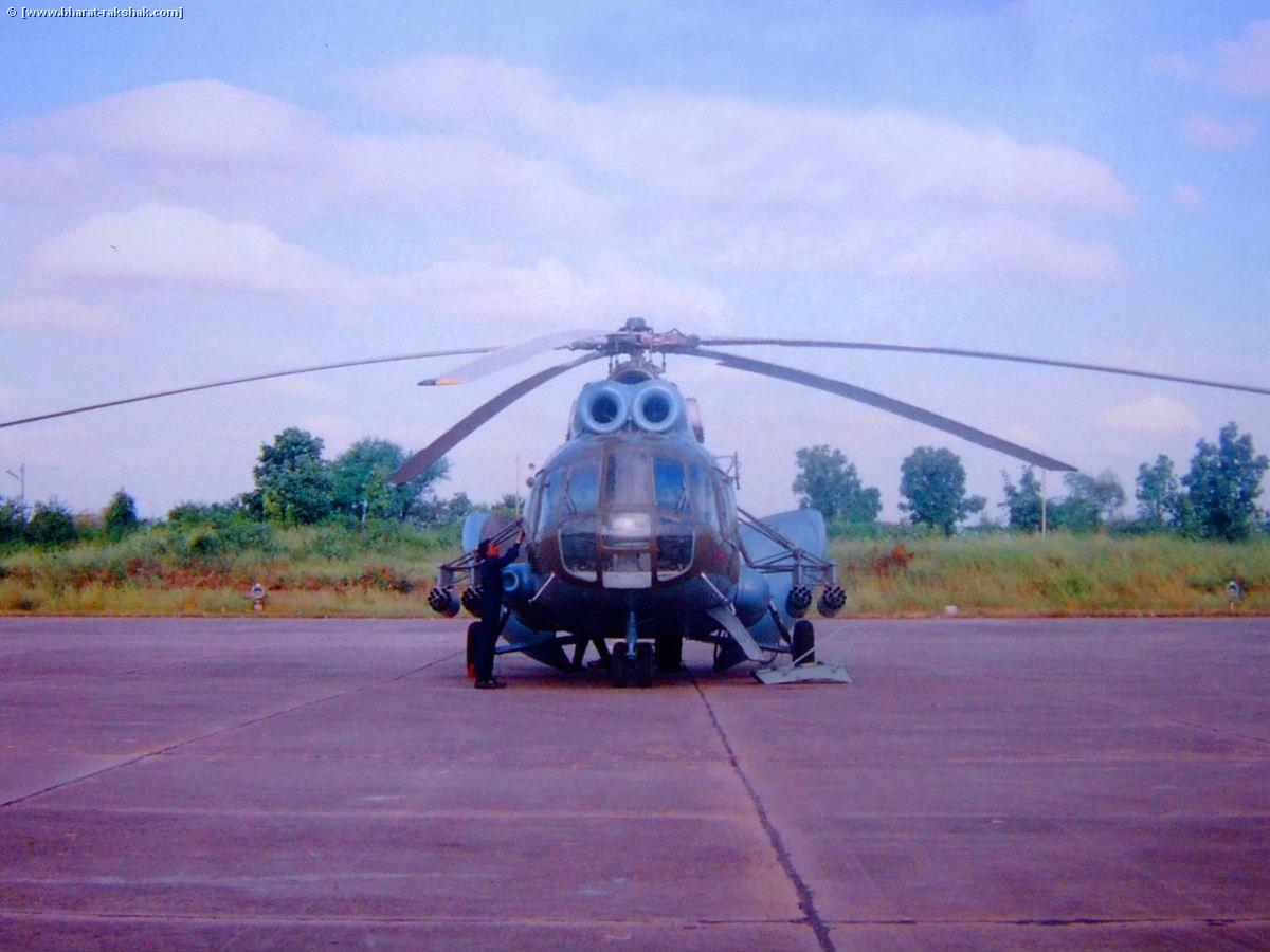 An Mi-8 helicopter equipped with four rocket pods.