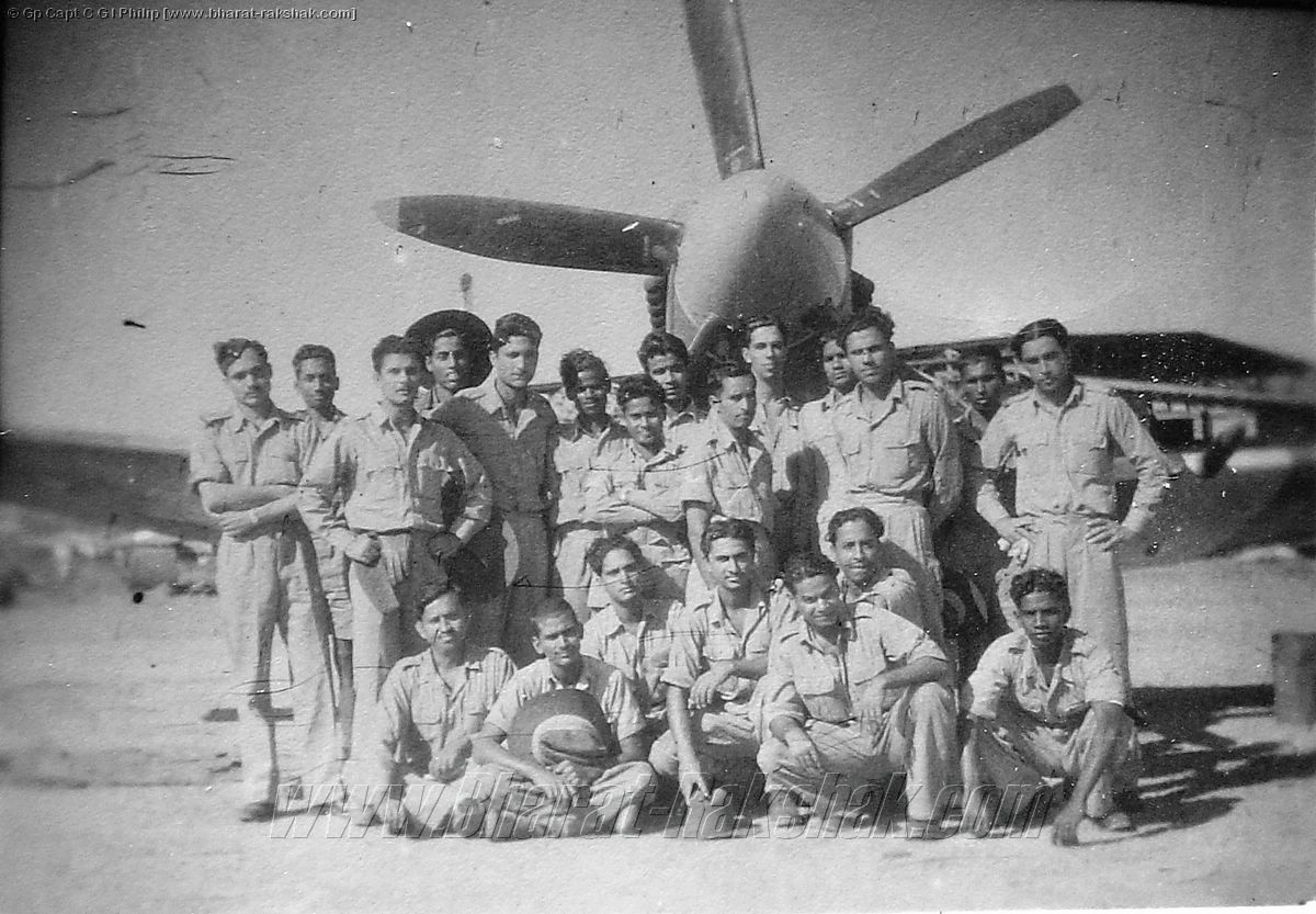 Airmen with one of the Spitfire XIVs